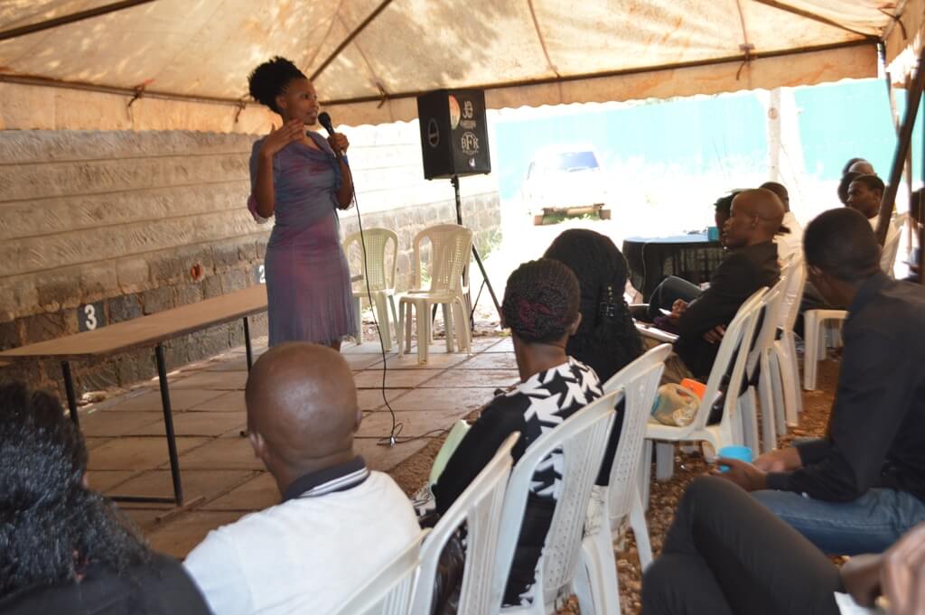 Caroline addressing youth at her church.