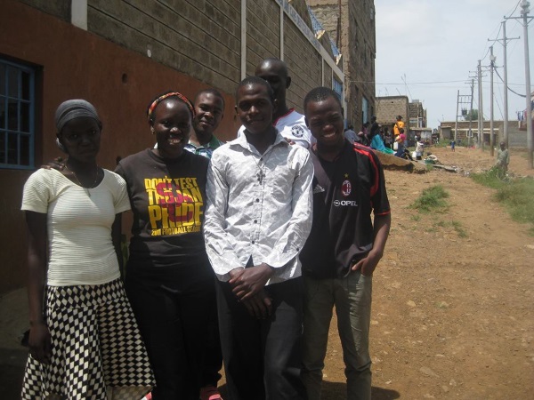 Joan with youth from Korogocho slum.